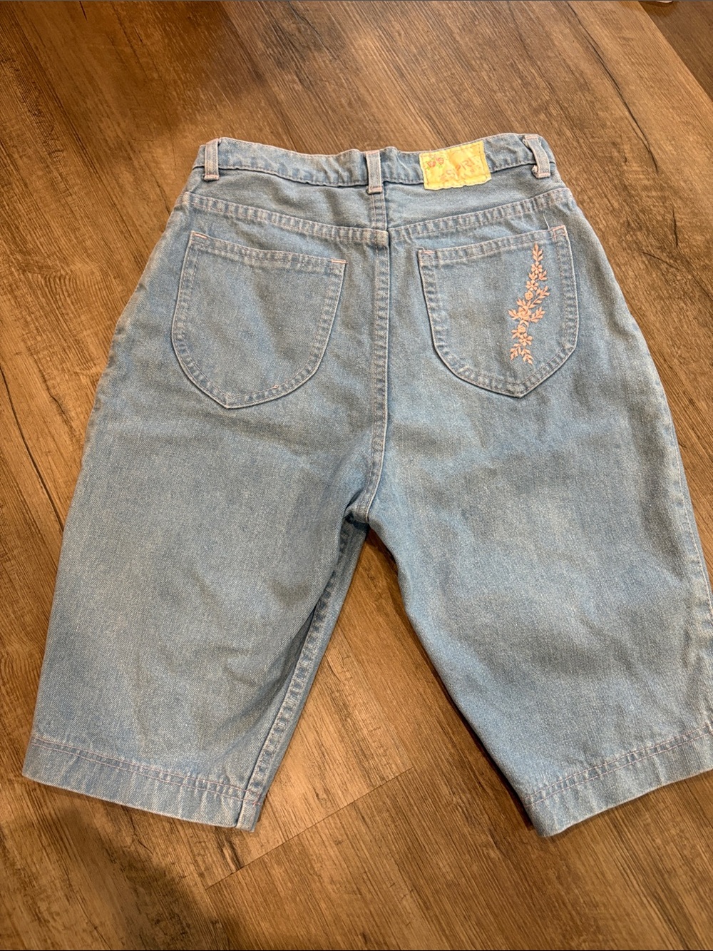 Light Blue Denim Women's Shorts with Pink Embroidered Pocket and Stitching